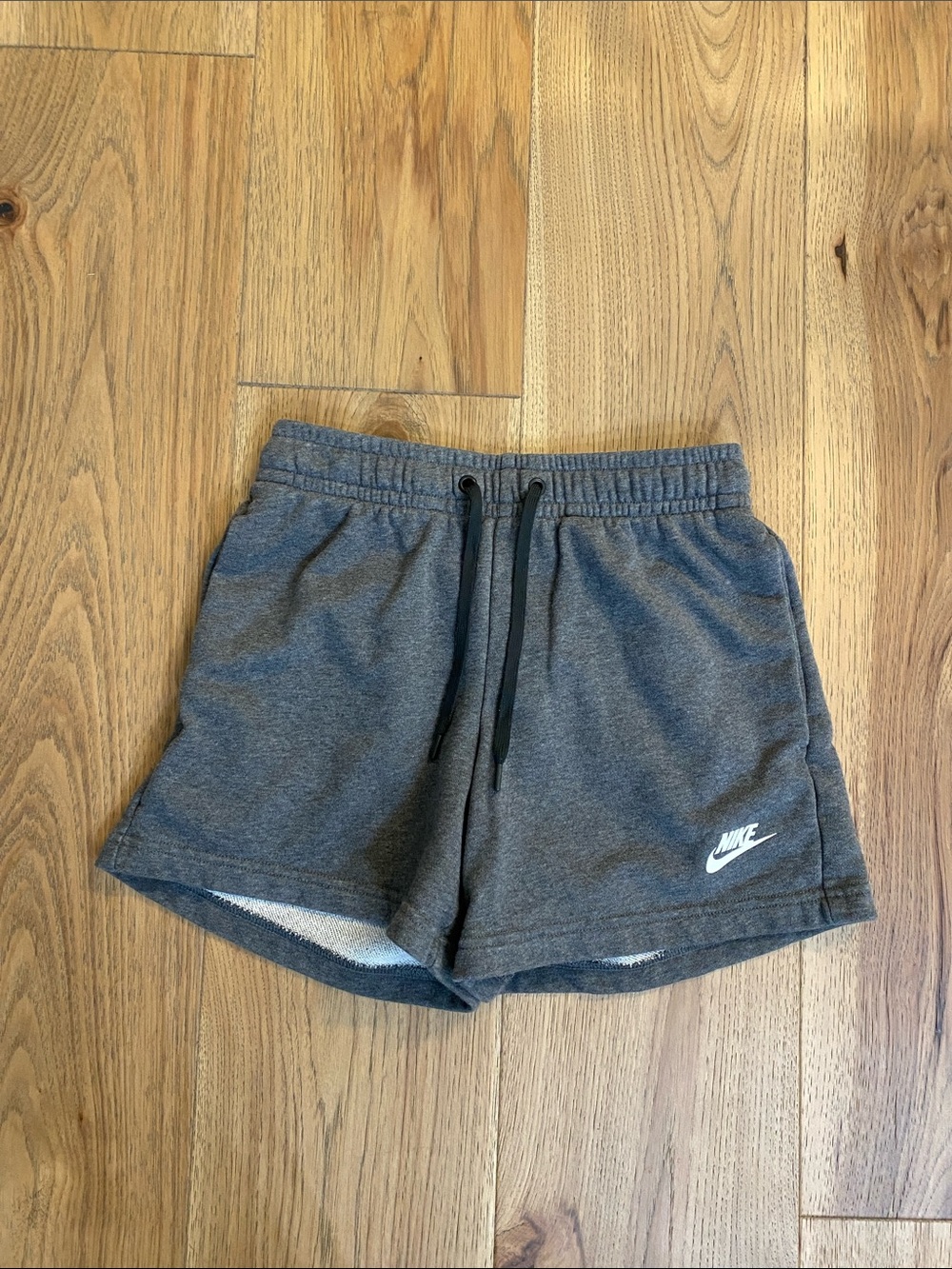 Nike Women's Dark Gray Athletic Pull-On Shorts with White Logo